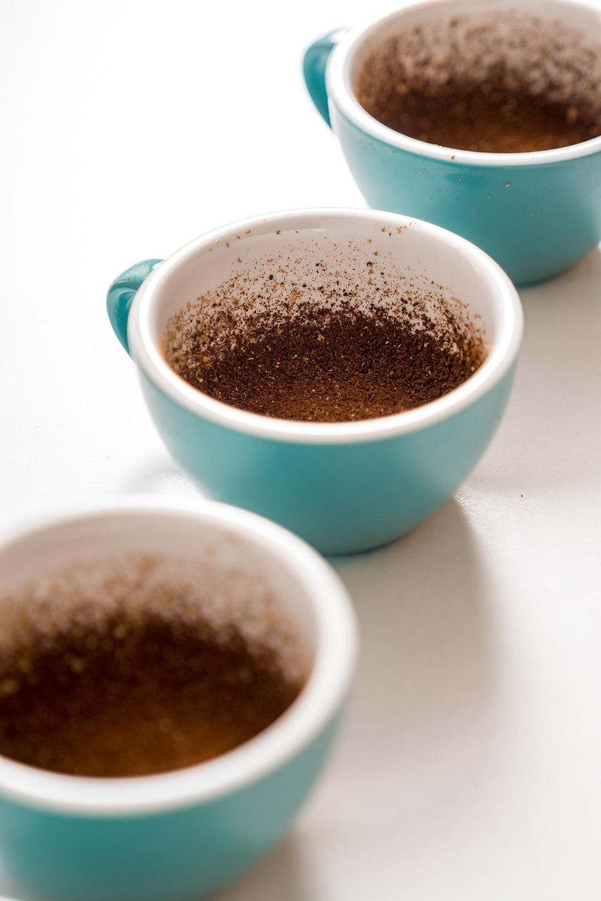 ground coffee, coffee, cup, coffee cup, fresh coffee, coffee powder, roasted coffee, aromatic, caffeine, closeup